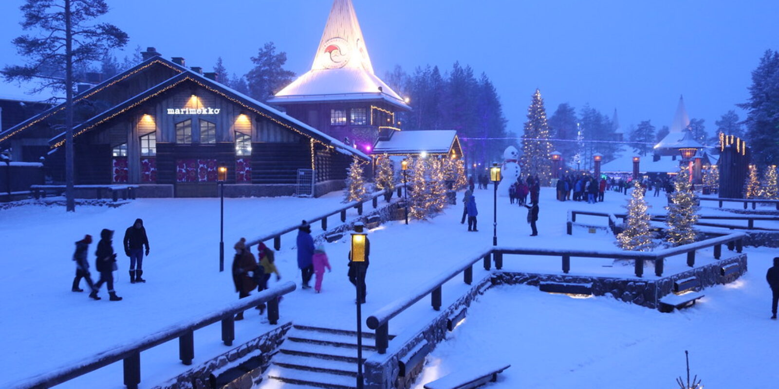 An image of tourists visiting the Santa Claus Village in Finland.