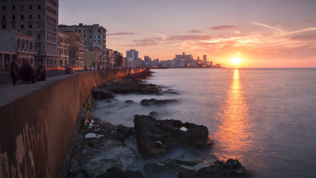 An image of the The Malecón with the sun setting. 