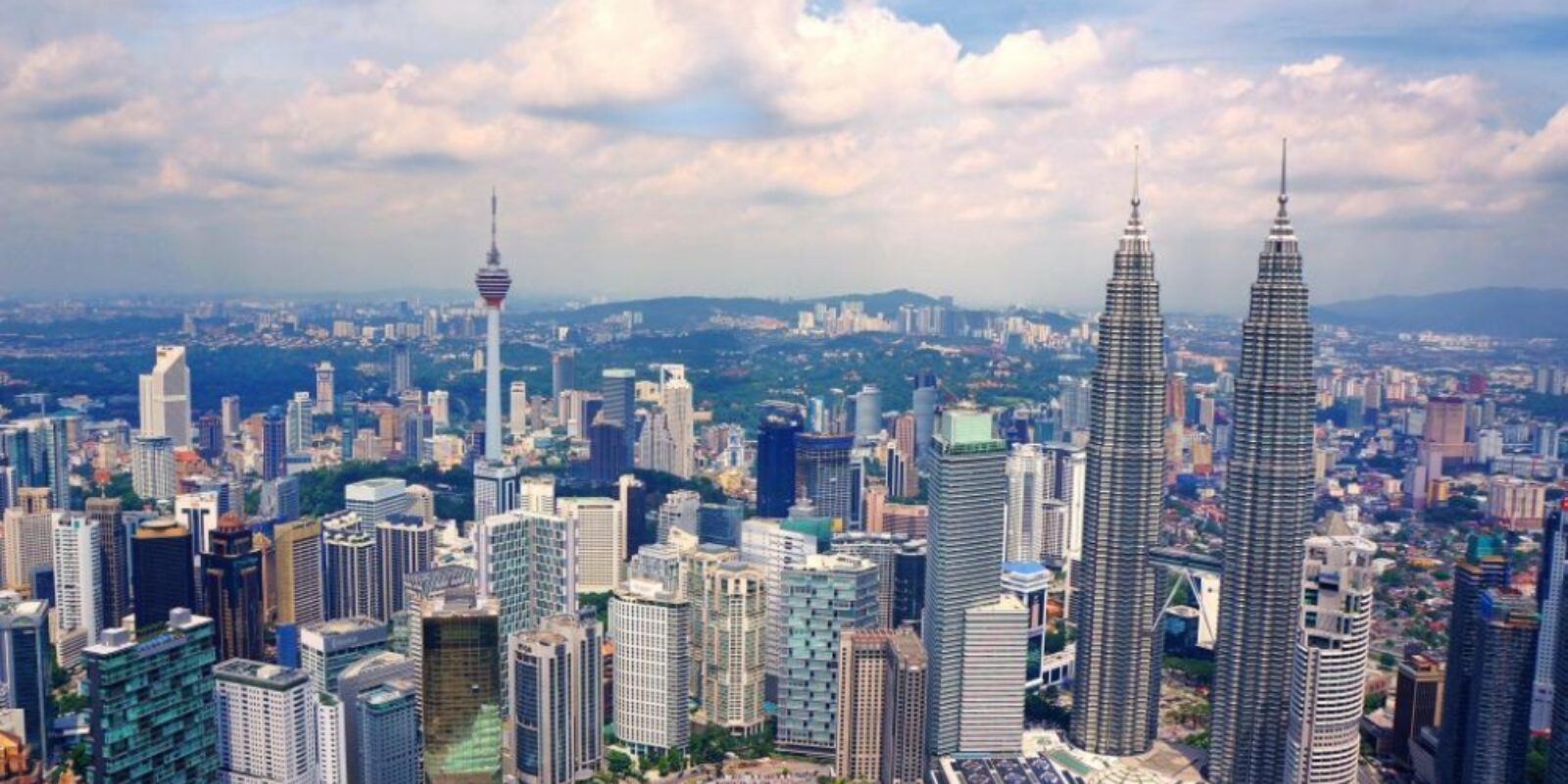 An image of the Kuala Lumpur skyline for an article about "senior vacation to Kuala Lumpur."