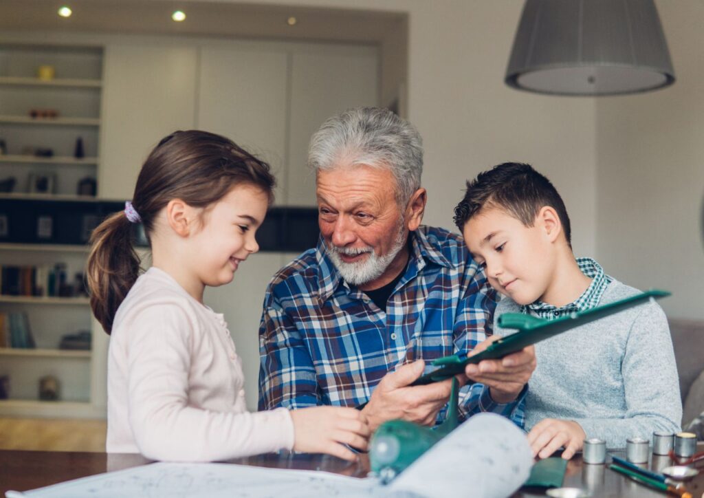 grandpa and grandchild crafting