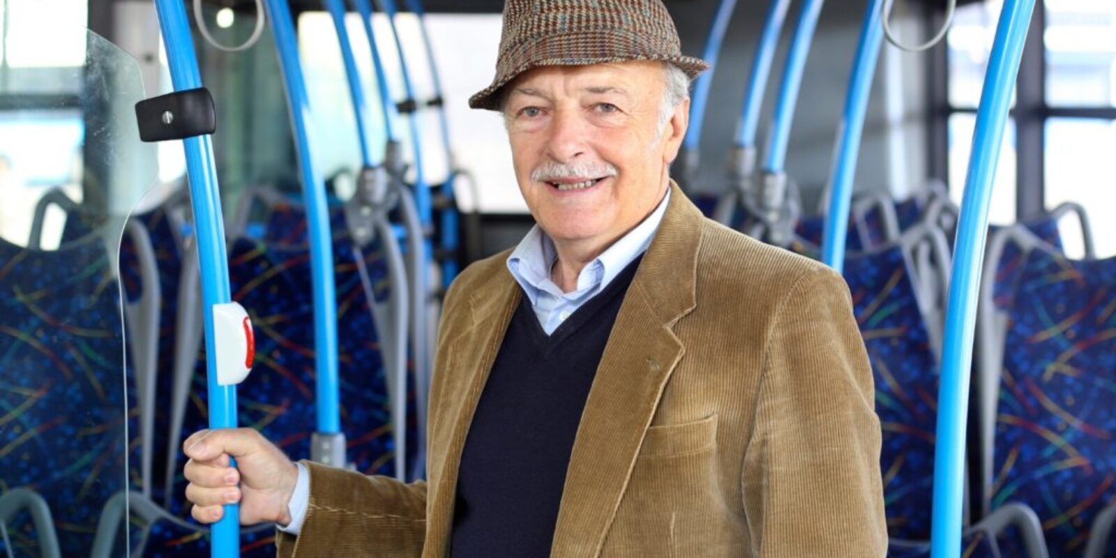 senior on a public transport