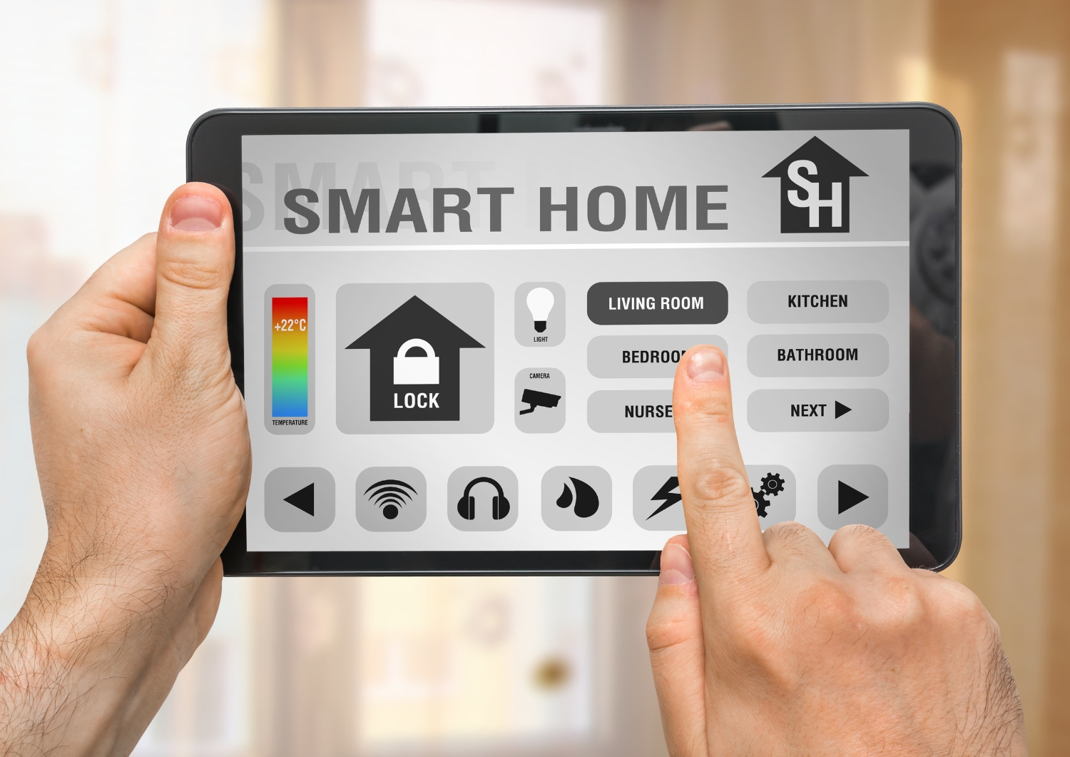 a person holding a tablet opening a home automation app